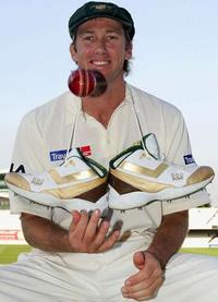 McGrath Changes Cricket Shoes after Taking a Wicket